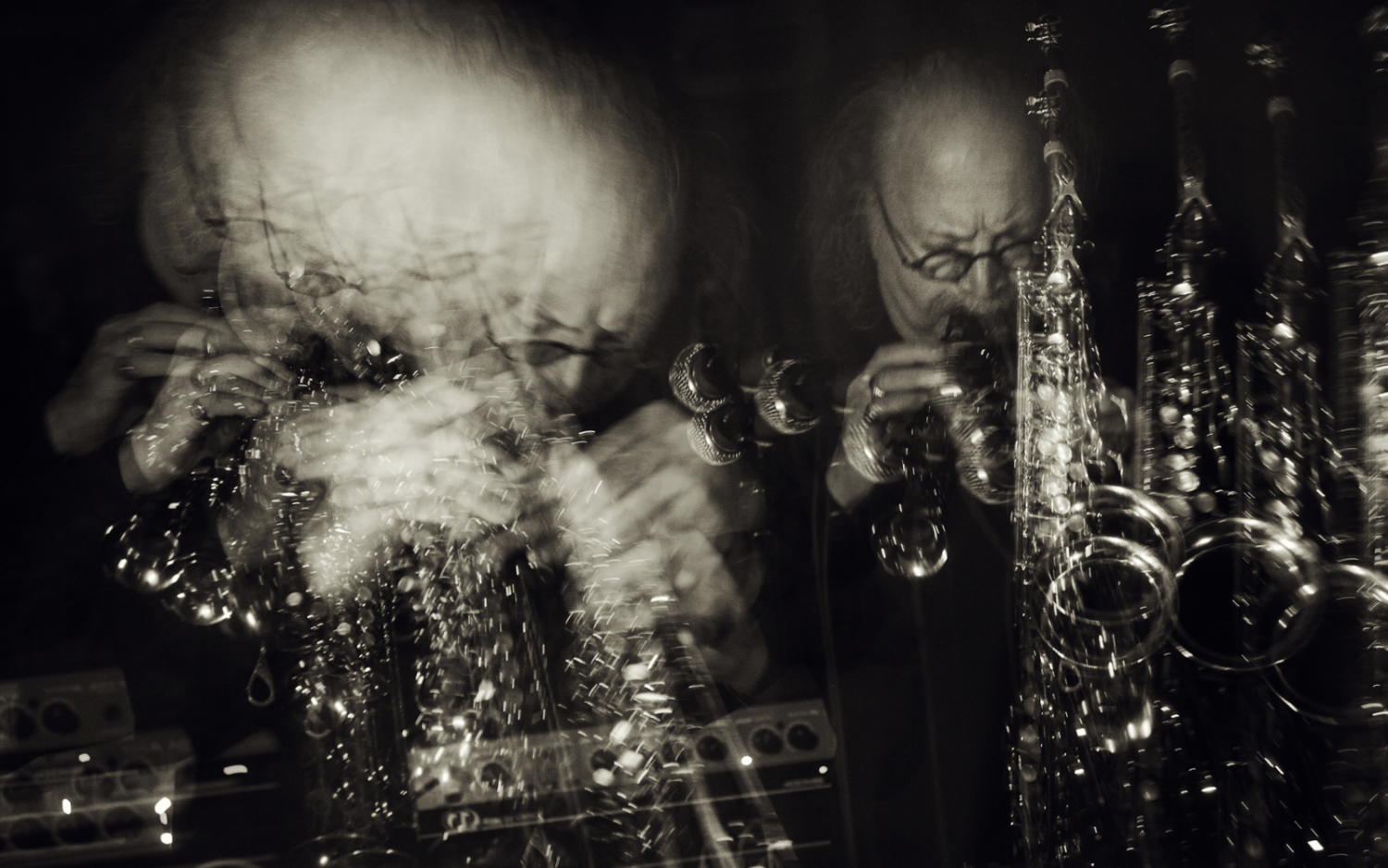 Dror Feiler plays the saxophone, doubled and blurred.