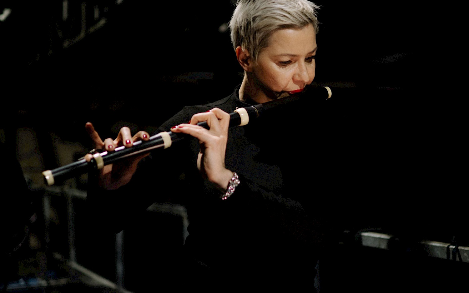 Maria Kalesnikava plays the flute.